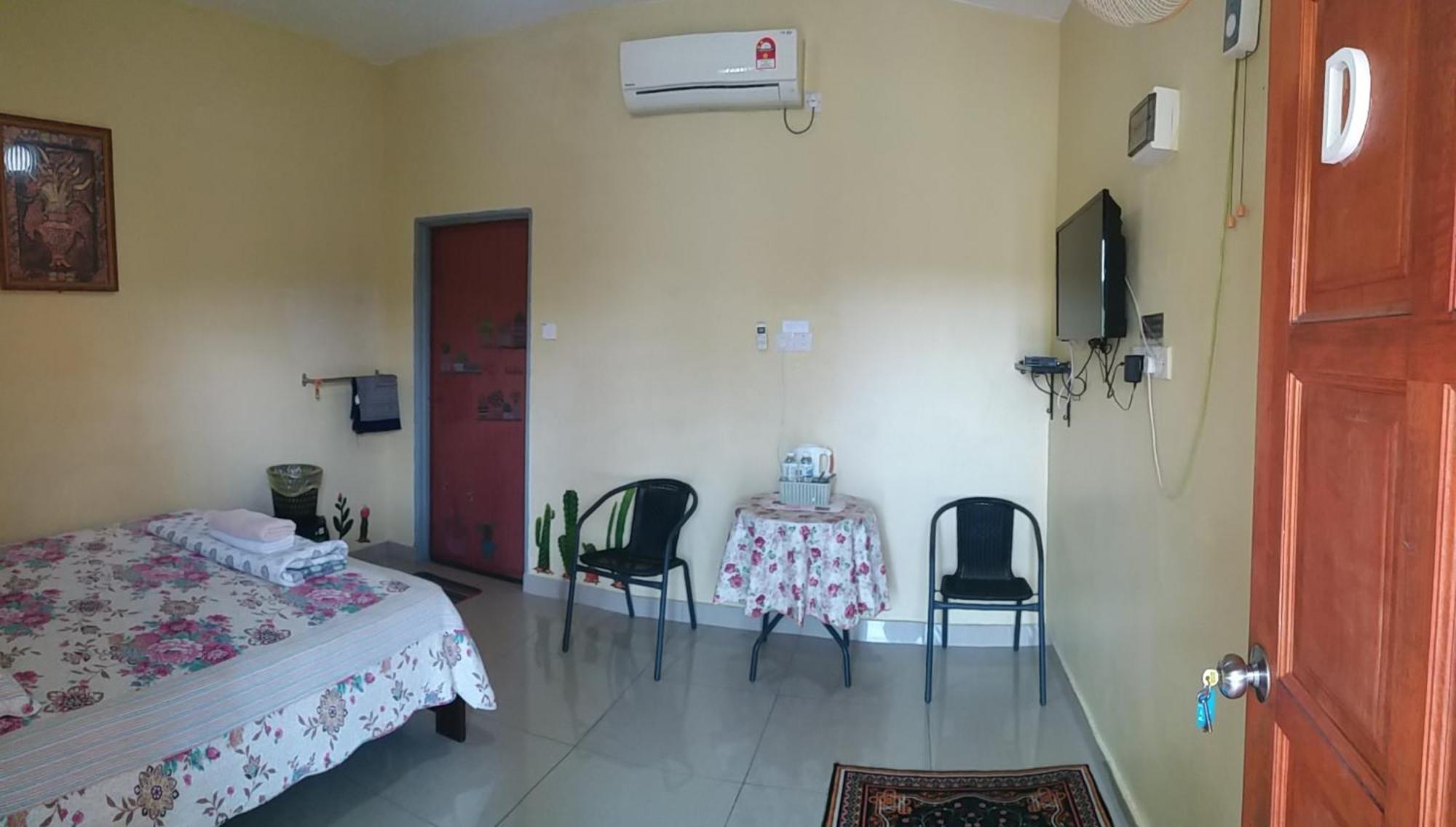 Dhia Irdina Homestay Paya Rewak Екстер'єр фото