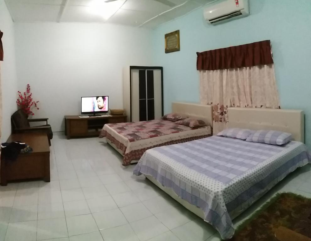 Dhia Irdina Homestay Paya Rewak Екстер'єр фото