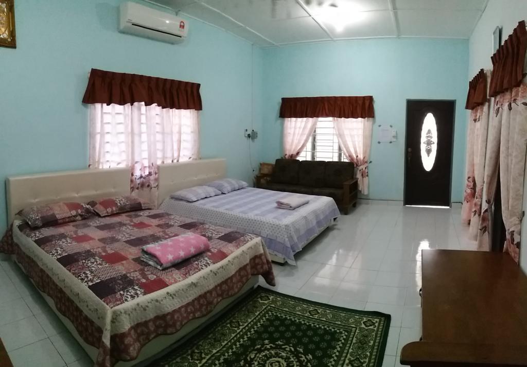 Dhia Irdina Homestay Paya Rewak Екстер'єр фото